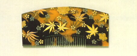 Comb Detailed with Hemp Leaves.